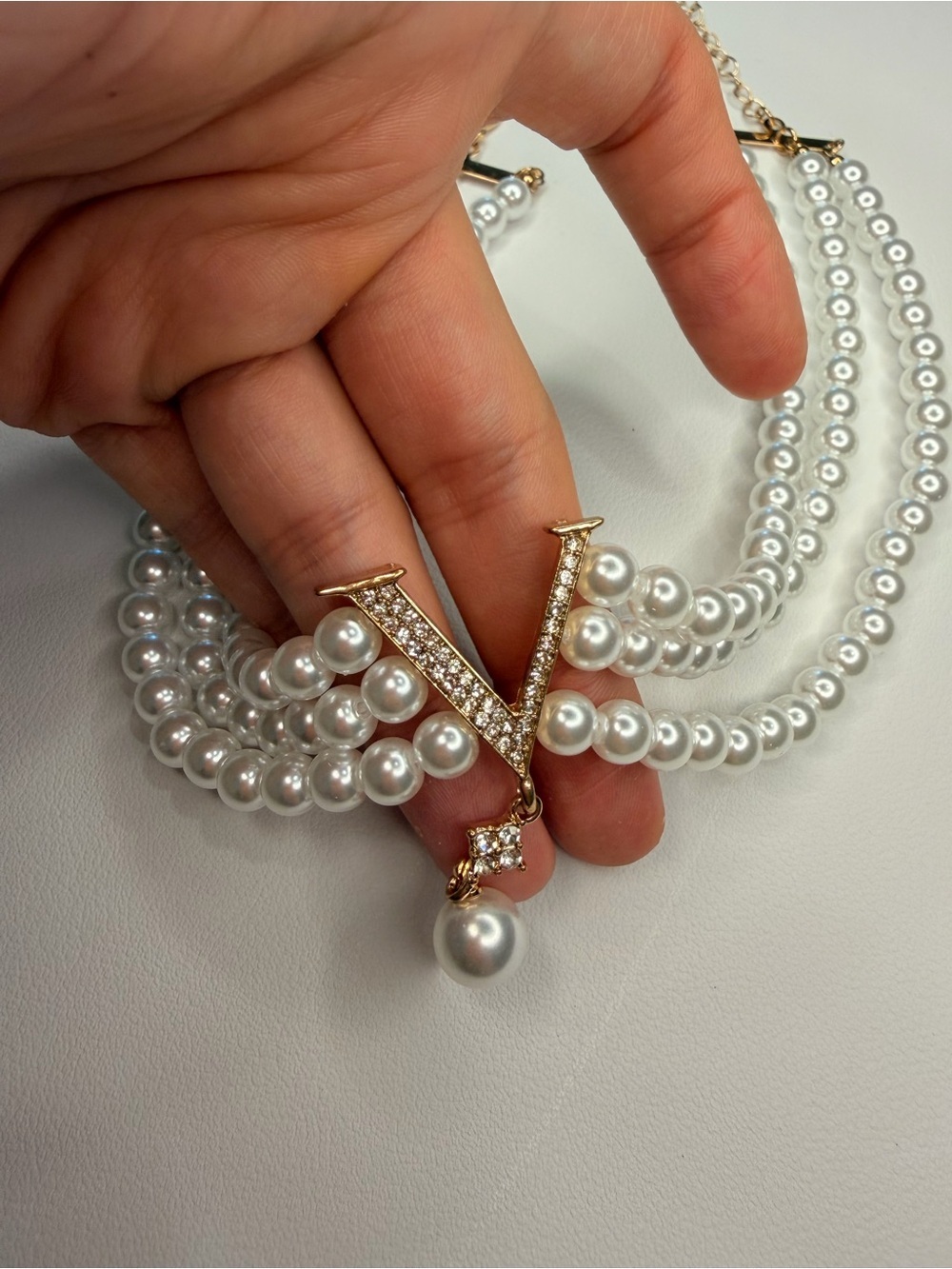 White Pearl Triple-Strand Choker with Gold V Pendant - Picture 7 of 8